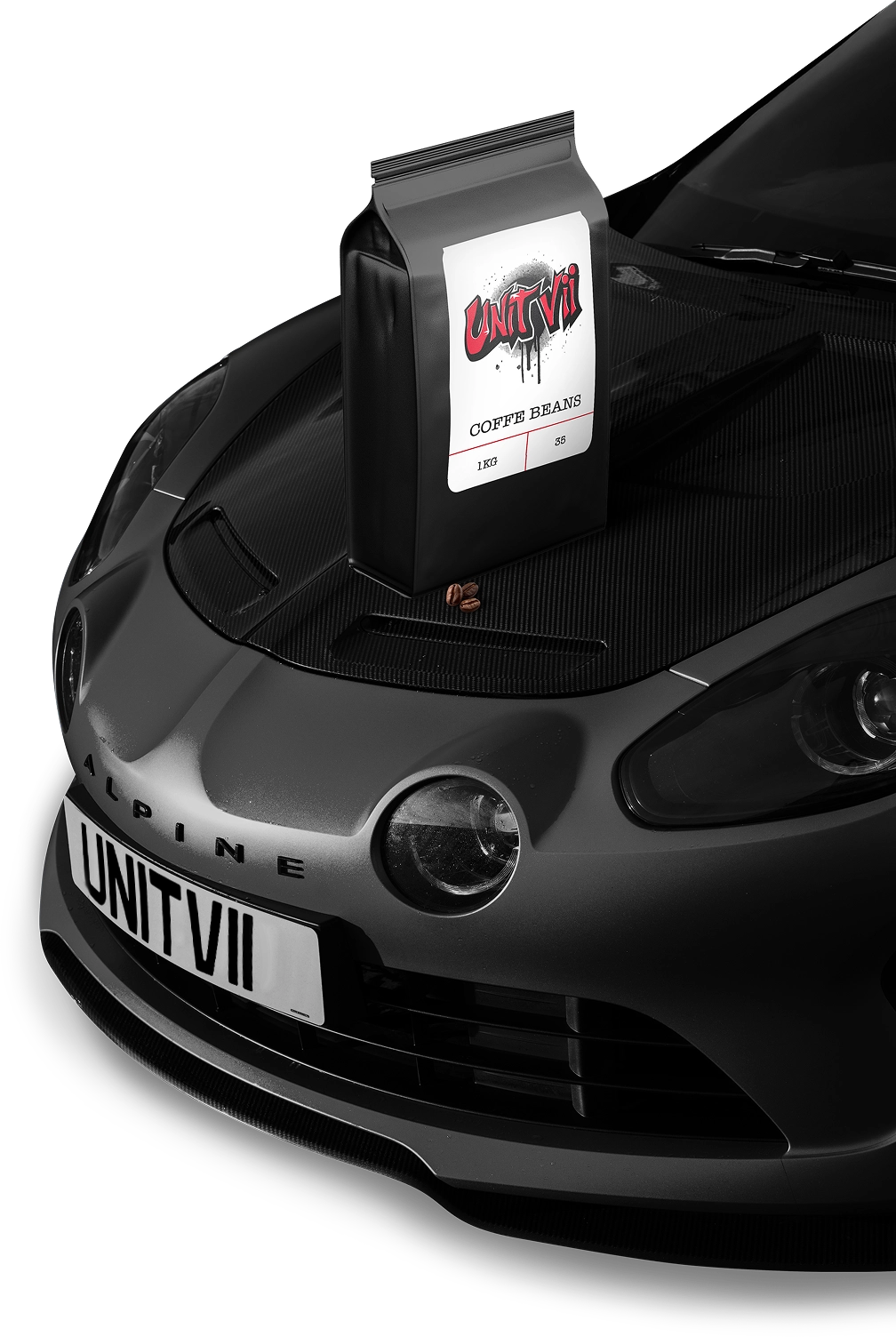 Custom car parked next to a bag of Unit Vii roasted coffee beans